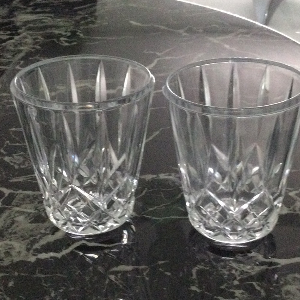 Two heavy Crystal Glasses pretty design on them.